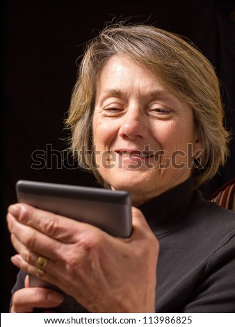 Older Woman using new technology