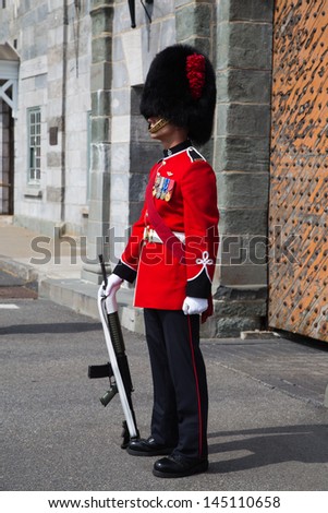 QUEBEC CITY, QUEBEC/CANADA Ã¢Â?Â? JULY 6: A Regiment guard in full dress uniform guarding La Citadelle, a historic active military fort shown on July 6, 2013 in Quebec City.