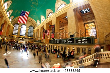 NEW YORK CITY- APRIL 17 : A fisheye view of commuters and tourists flood the grand central station during the Friday afternoon rush hour April 17, 2009 in New York.