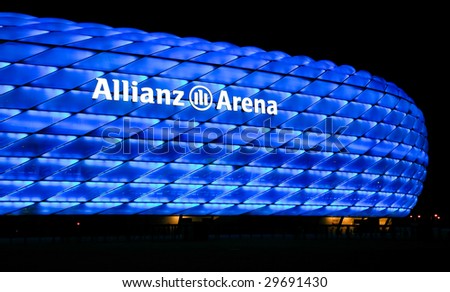 MUNICH – CIRCA SEPT 2008 : Colorful illumination of Allianz Arena, FIFA 2006 World Cup Stadium circa September 2008 in Munich. The stadium has nicknames such as UFO, rubber dinghy, and lifebelt.