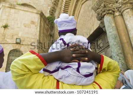 JERUSALEM - APRIL 05 : Nigerian pilgrims visit the church of the Holy Sepulcher in Jerusalem Israel during Easter on April 05 2012