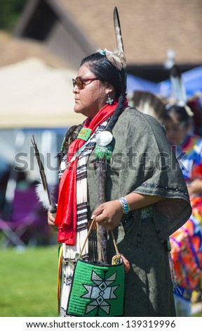 MARIPOSA ,USA - MAY 11 : An unidentified Native Indian woman takes part at the Mariposa 20th annual Pow Wow in California , USA on May 11 2013 ,Pow wow is native American cultural gathernig event.