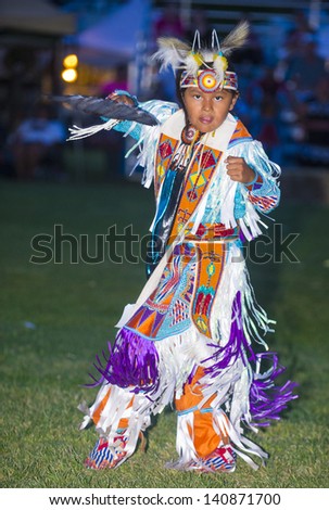 MARIPOSA ,USA - MAY 11 : An unidentified Native Indian boy takes part at the Mariposa 20th annual Pow Wow in California , USA on May 11 2013 ,Pow wow is native American cultural gathernig event.