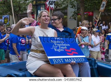 SAN FRANCISCO -  JUNE 30 : Kris Perry and Sandy Stier from the American Foundation for Equal Rights take part at the annual San Francisco Gay pride parade on June 30 2013