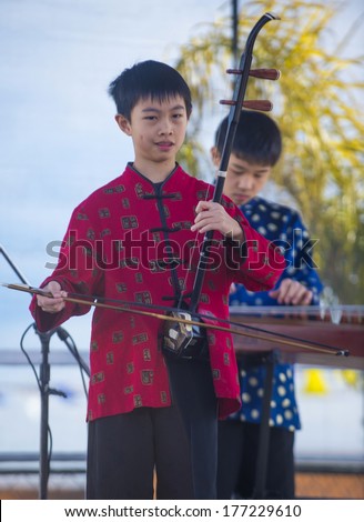 LAS VEGAS - FEB 09 : Chinese musicians perform during the Chinese New Year celebrations held in Las Vegas , Nevada on February 09 2014