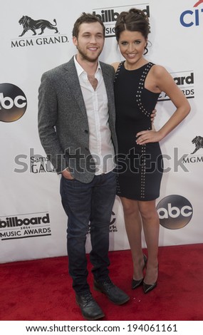 LAS VEGAS - MAY 18 :  Singer/songwriter Phillip Phillips (L) and Hannah Blackwell attend the 2014 Billboard Music Awards at the MGM Grand Garden Arena on May 18 , 2014 in Las Vegas.