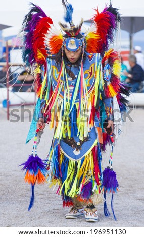 LAS VEGAS - MAY 24 : Native American man takes part at the 25th Annual Paiute Tribe Pow Wow on May 24 , 2014 in Las Vegas Nevada. Pow wow is native American cultural gathernig event.