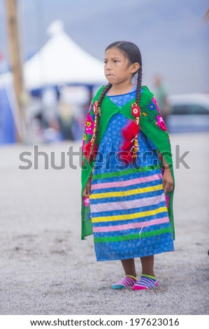 LAS VEGAS - MAY 24 : Native American girl takes part at the 25th Annual Paiute Tribe Pow Wow on May 24 , 2014 in Las Vegas Nevada. Pow wow is native American cultural gathernig event.