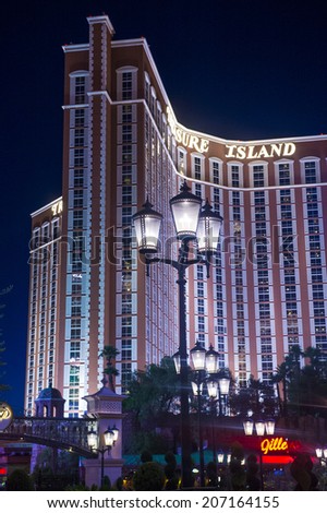 LAS VEGAS - JULY 21 : Treasure Island hotel and casino on July 21 2014 in Las Vegas.  This Caribbean themed resort has an hotel with 2,884 rooms.