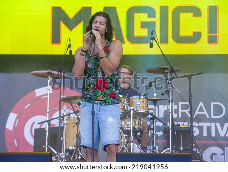LAS VEGAS - SEP 20: Singer Nasri Atweh and fellow band members of Magic! performs on stage at the 2014 iHeartRadio Music Festival Village on September 20, 2014 in Las Vegas.