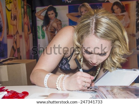 LAS VEGAS - JAN 23 : Adult film actress Dakota James Giving autographs to fans at the 2015 AVN Adult Entertainment Expo at the Hard Rock Hotel & Casino on January 23, 2015 in Las Vegas.