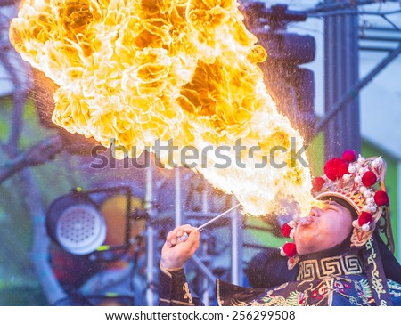 LAS VEGAS - FEB 21 : Chinese master of masks perform at the Chinese New Year celebrations held in Las Vegas , Nevada on February 21 2015