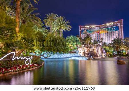 LAS VEGAS - MARCH 18 : The Mirage Hotel artificial volcano and Treasure Island hotel and casino on March 18 , 2015 in Las Vegas.  This Caribbean themed resort has an hotel with 2,884 rooms.