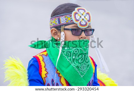 LAS VEGAS - MAY 24 : Native American boy takes part at the 26th Annual Paiute Tribe Pow Wow on May 24 , 2015 in Las Vegas Nevada. Pow wow is native American cultural gathernig event.
