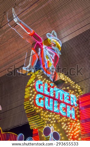 LAS VEGAS - MAY 17 : Cowgirl neon sign in downtown Las Vegas on May 17 2015. The iconic sign of Glitter Gulch is placed in 20 East Fremont Street, in Downtown Las Vegas