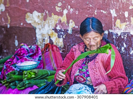 CHICHICASTENANGO , GUATEMALA - JULY 26 : Portrait of an old Guatemalan woman at the Chichicastenango Market on July 26 2015. This native market is the most colorful in Central America