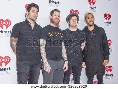 LAS VEGAS - SEP 19 : (L-R) Joe Trohman, Andy Hurley, Patrick Stump and Pete Wentz of Fall Out Boy attends the 2015 iHeartRadio Music Festival on September 19, 2015 in Las Vegas, Nevada.