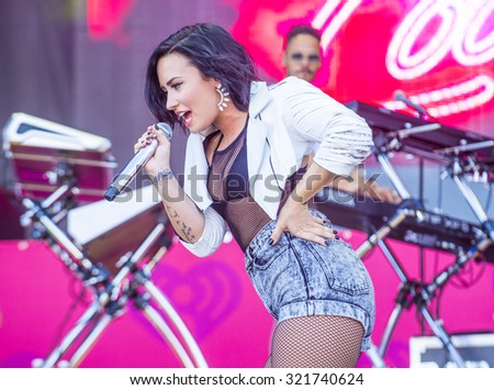 LAS VEGAS - SEP 19 : Recording artist Demi Lovato performs onstage at the 2015 iHeartRadio Music Festival at the Las Vegas Village on September 19, 2015 in Las Vegas, Nevada.