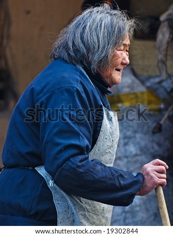 Shanghai China mars 2008 - old Chinese woman