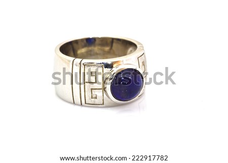 ring of the jeweler with blue sapphire and brilliants on a white background