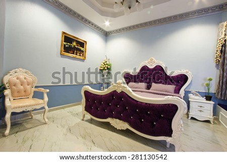 KACHANABURI, THAILAND - 09 MAY 2015- Editorial: Fantastic bedroom interior with purple bed at Cinque terre Hotel
