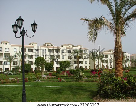 grass-plot in the hotel with building in the background. Hurgada. Egypt