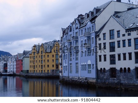 view with sea-front at the city of Alesund , Norway. White night time  shoot
