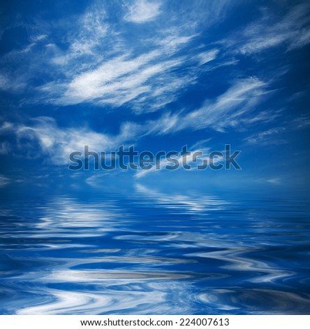 Large white clouds and calm sea. natural composition