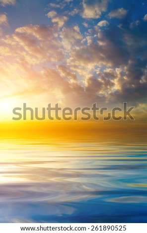 Beautiful sunset on the background of the calm sea. natural composition