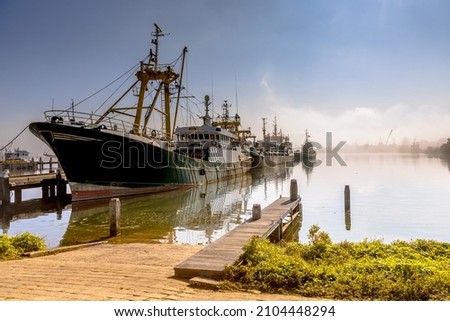 Similar – Image, Stock Photo A fishing cutter, the danger buoy, sailing yachts on the Wadden Sea can be seen