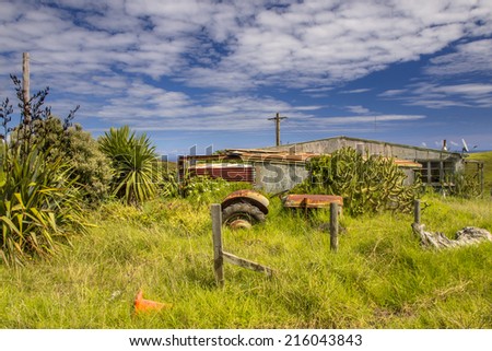 Grunge farmyard on green Countryside in New Zealand
