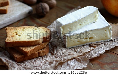 French Camembert cheese and slices of white toasted bread