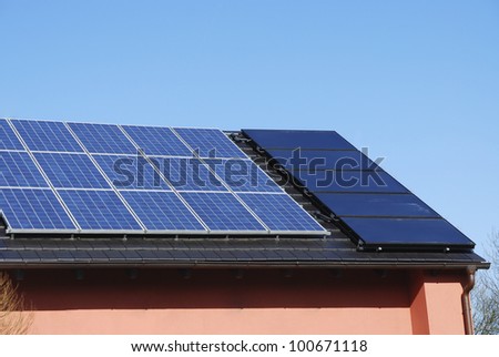 House roof with photovoltaics installation and solar heating system