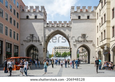 MUNICH, GERMANY - JUNE 4: Tourists in the pedestrian area of Munich, Germany on June 4, 2014. Munich is the biggest city of Bavaria  with almost 100 million visitors a year.