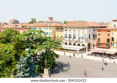 VERONA, ITALY - JUNE 3: Tourists at the Piazza Bra in  Verona, Italy on June 3, 2015. Verona is famous for its amphitheatre that could host more than 30,000 spectators in ancient times.