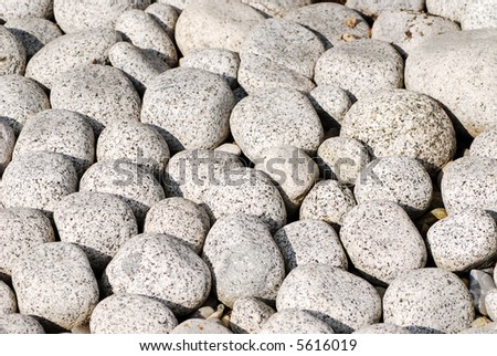 A lot of grey river pebbles.