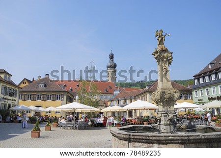 WEIKERSHEIM, GERMANY - APRIL 24: Marketplace of the historic town of Weikersheim, Germany on April 24, 2011. The castle is the traditional seat of the princely family Hohenlohe.