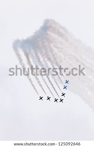 CADIZ, SPAIN-SEP 11: Aircrafts of the Patrulla Aguila taking part in a test on the 2nd airshow of Cadiz on Sep 111, 2009, in Cadiz, Spain