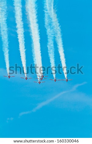 CADIZ, SPAIN-SEP 11: Aircrafts of the Patrulla Aguila taking part in an exhibition on the 4th airshow of Cadiz on Sep 11, 2011, in Cadiz, Spain