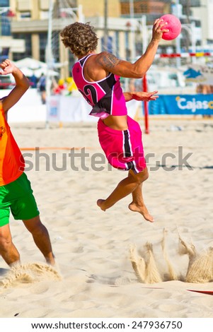 CADIZ, SPAIN - JULY 19: Unidentified players compete in a match between Autoescuela Barquin and CadizSur Seguros BMPY in the 19th league of beach handball of Cadiz on July 19, 2011 in Cadiz, Spain