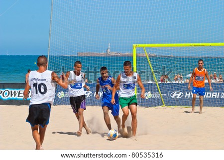 CADIZ, SPAIN -  JUL 22:  Unknown players of unknown team playing the Spanish Championship of Beach Soccer on Jul 22, 2006 on the beach of La Victoria in Cadiz, Spain