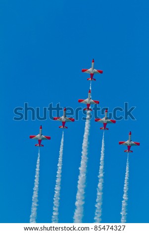 CADIZ, SPAIN-SEPT 9: Aircrafts of the Patrulla Aguila take part in a test on the 4th airshow of Cadiz on Sept 9, 2011 in Cadiz, Spain