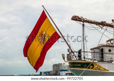 CADIZ, SPAIN - APR 01: Spanish flag on Stern of the Spanish Navy Training Ship, Juan Sebastian de Elcano setting sail on the 83rd cruise of instruction,  on April 01 , 2012, in Cadiz , Spain