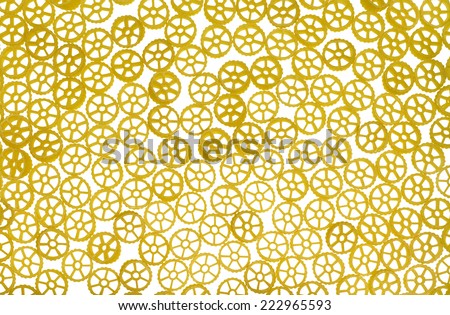 full frame italian pasta background with lots of Ruote noodles side by side in white back