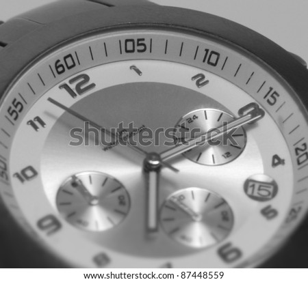 detail studio photography of a wristwatch clockface