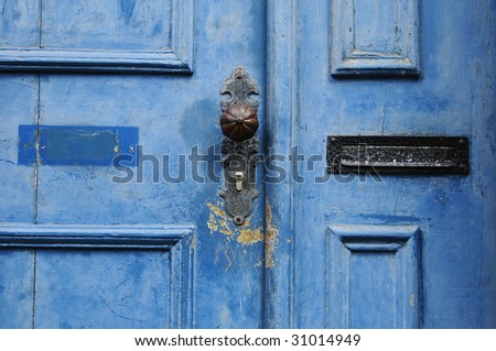 beautiful blue door with mail slot