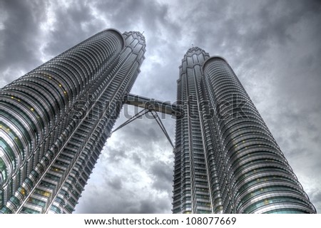KUALA LUMPUR - NOV 26: (HDR) The Petronas Twin Towers on November 26, 2011, in Kuala Lumpur, Malaysia are the world\'s tallest twin tower. The skyscraper height is 451.9m