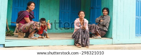 FALAM, MYANMAR - JUNE 17 2015: Local family in the recently opened to foreigners area of Chin State - western Myanmar (Burma)