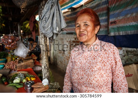 CHIN STATE, MYANMAR - JUNE 18, 2015: Lady in marketplace in the recently opened for tourists Chin State Mountainous Region, Myanmar (Burma)