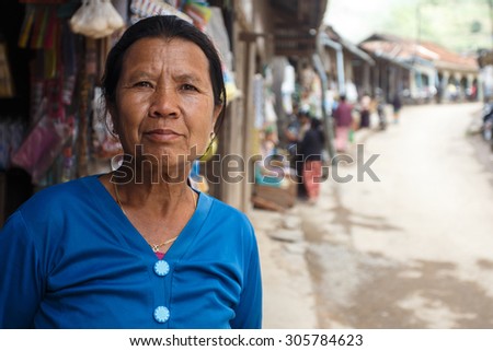 CHIN STATE, MYANMAR - JUNE 18, 2015: Lady in Falam Centre in the recently opened for tourists Chin State Mountainous Region, Myanmar (Burma)